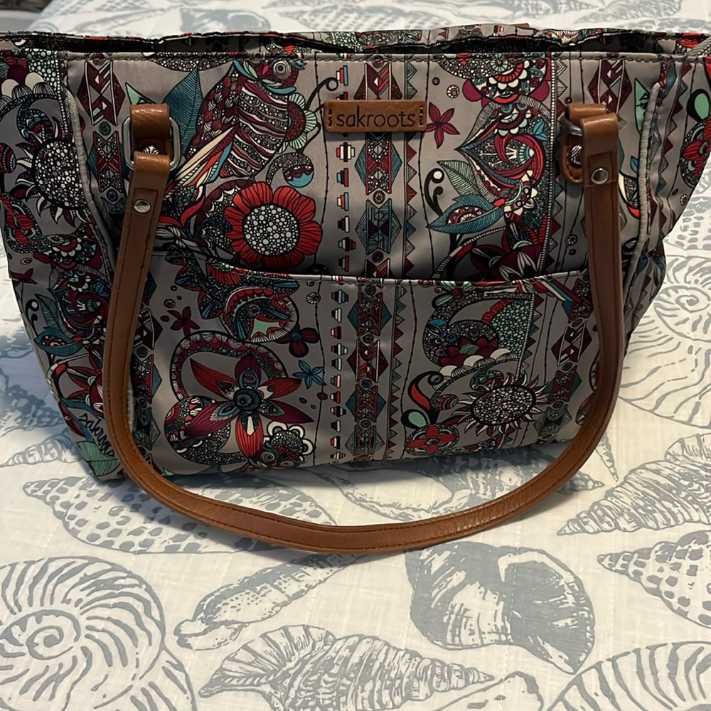 Sakroots purse in excellent condition with multi print with owls. 10x14x4”